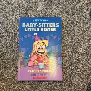 Scholastic Graphic Novel with Blue and Pink Cover